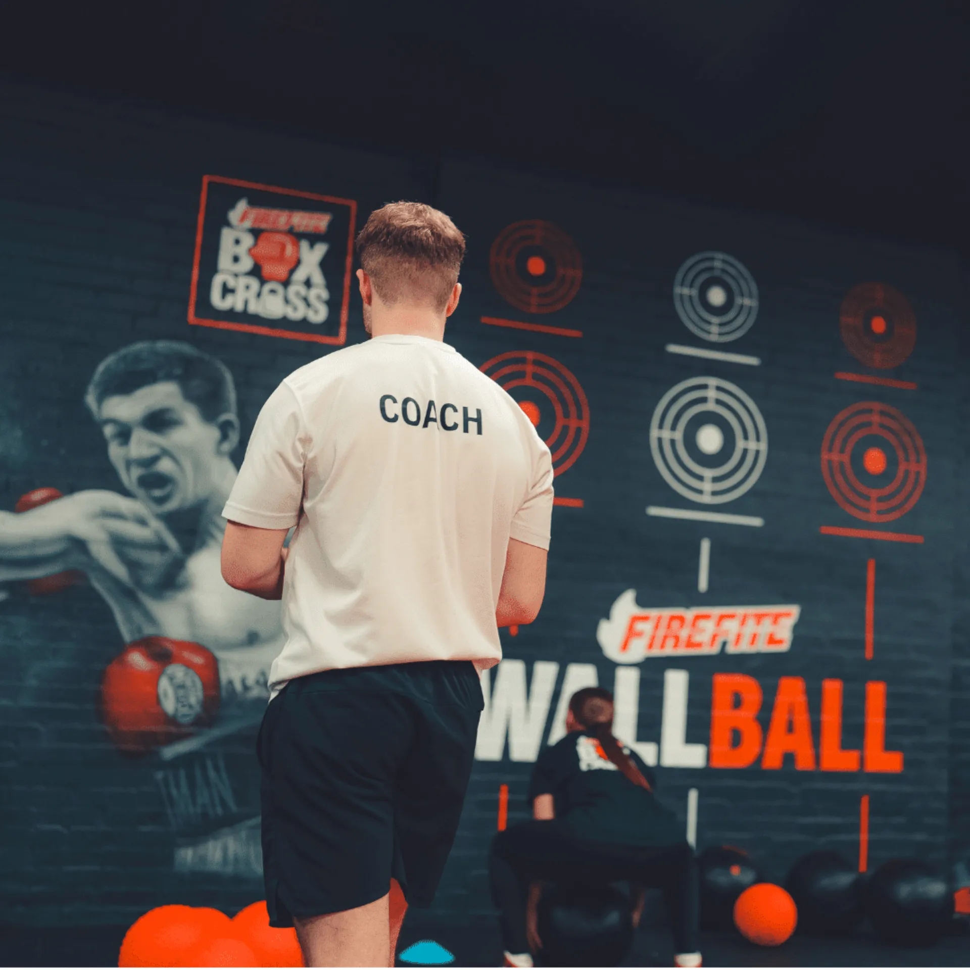 Coach leading a Boxcross session